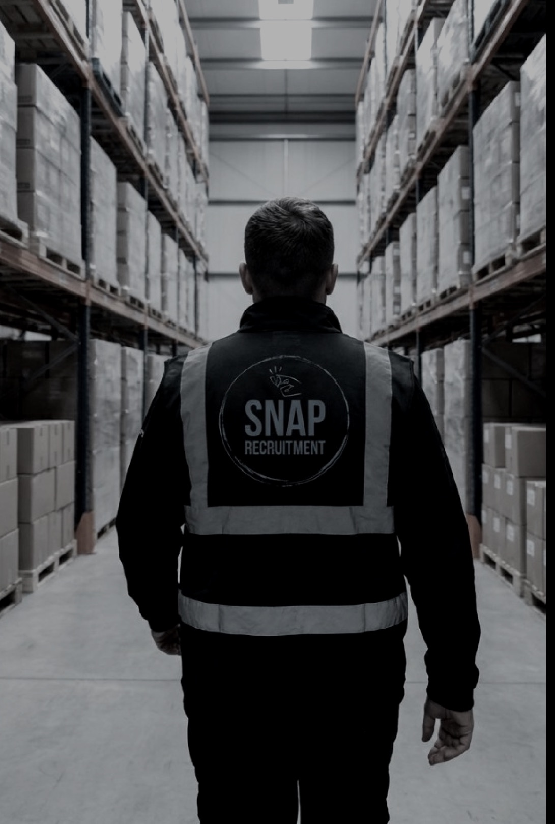 A warehouse worker in an active distribution environment.